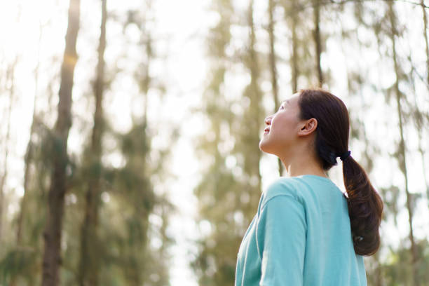 istock Asian young woman relaxing in nature. 2025453855