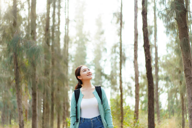istock Asian young woman relaxing in nature. 2025453884