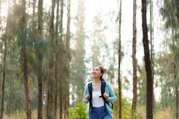 istock Asian young woman relaxing in nature. 2025454401