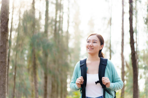 istock Asian young woman relaxing in nature. 2025454402