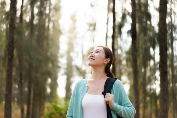 istock Asian young woman relaxing in nature. 2025454416