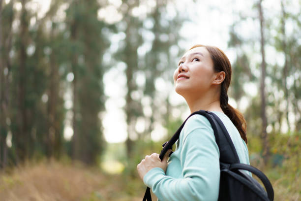 istock Asian young woman relaxing in nature. 2025454425