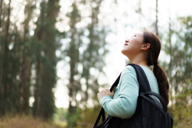 istock Asian young woman relaxing in nature. 2025454431