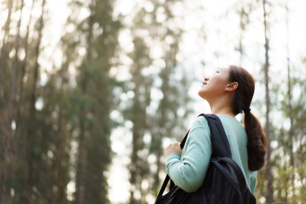 istock Asian young woman relaxing in nature. 2025454435