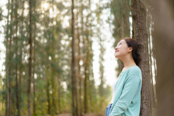 istock Asian young woman relaxing in nature. 2025454972