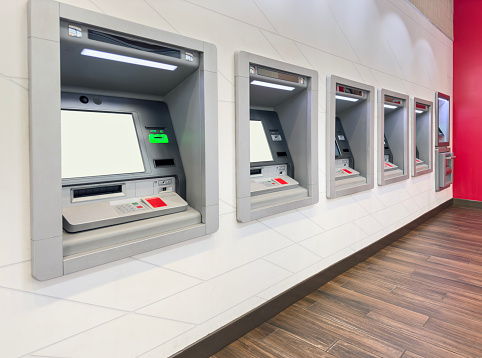 Atm machines side by side in a bank