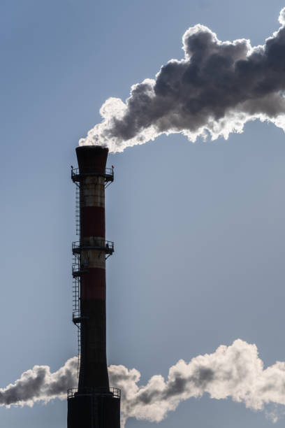istock Plumes of smoke from a chimney in backlight. 2025531301