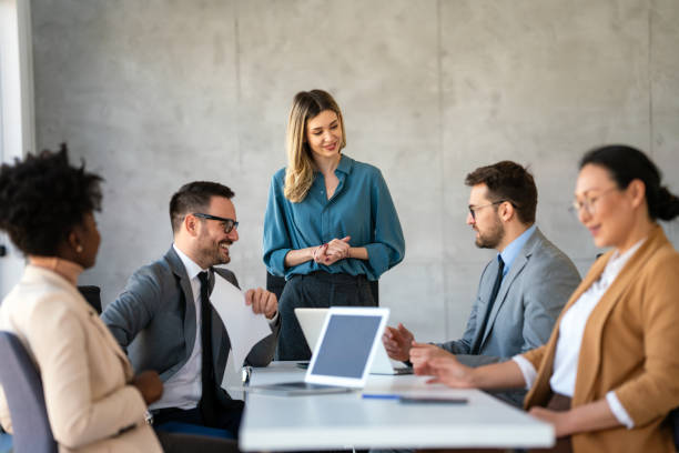 istock Multicultural professional businesspeople working together on research plan in boardroom. 2025545253