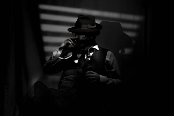 istock Film Noir detective in dark office 2025557226