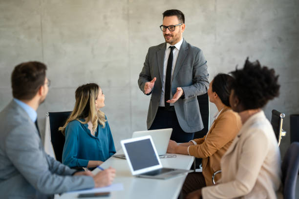 istock Successful multiethnic business people presenting analytical report while working together in office 2025563549
