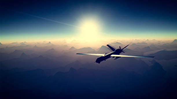 istock Mountain reliefs, war operations, sci-fi, night vision with blue hues. Military target. Drone flying over an area. Military operation 2025577798