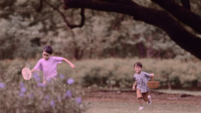 Boy running in the garden