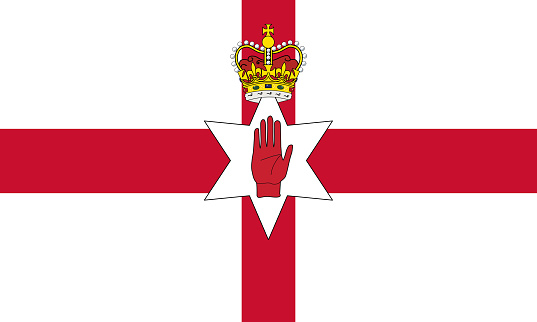 Close-up of white and red national flag of European country of Northern Ireland with golden crown and red hand. Illustration made February 20th, 2024, Zurich, Switzerland.