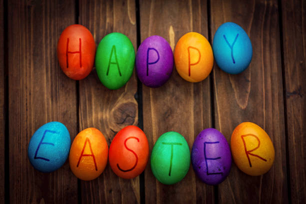 Colorful Easter Eggs on the wooden background
