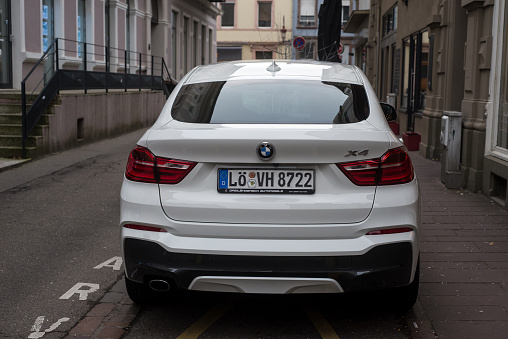 Mulhouse - France - 18 february 2024 - rear view of BMW X4 parked in the street