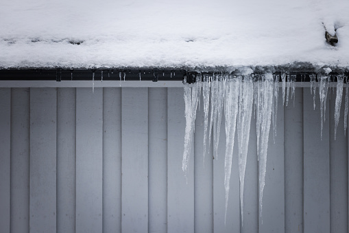Winter landscape with stalactites ice.