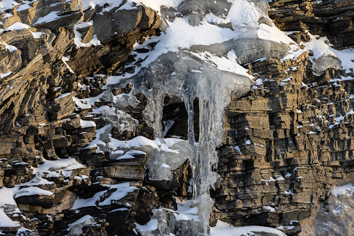 Winter landscape with stalactites ice.