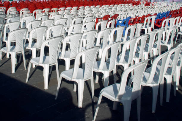 Black plastic chairs for outdoor shows