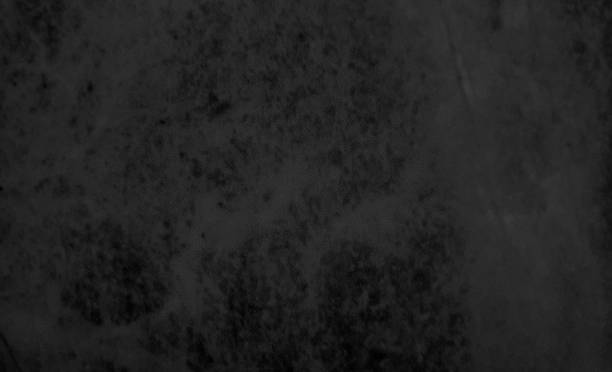 dark black soft stone tile texture for background in close up view. background texture of polished marble surface of natural stone, luxurious wallpaper with blank space for design.