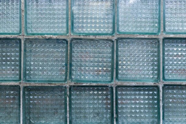 istock Rough transparent wall made of glass blocks, background texture 2025849328