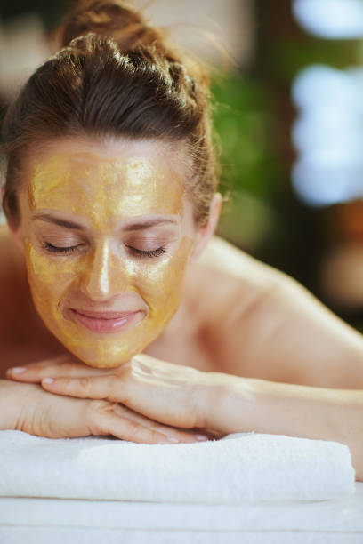 istock relaxed modern woman in spa salon laying on massage table 2025871647