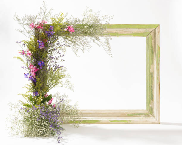 Frame and garlands with flower arrangements