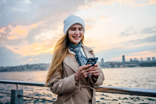 Woman using phone in Istanbul
