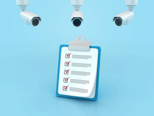 Check List Clipboard with Security Cameras stock photo