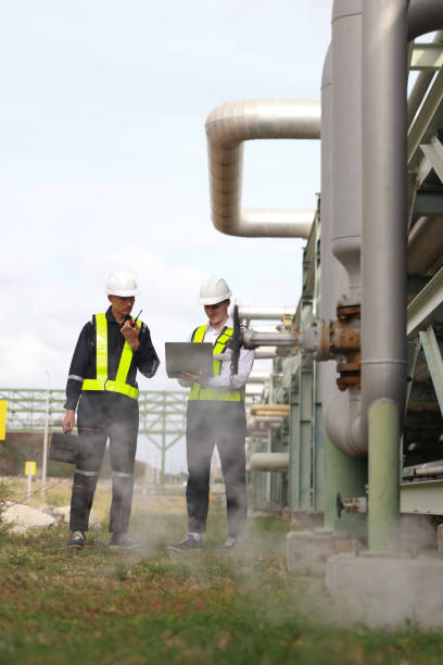 istock The piping system engineer and technician work onsite in the piping systematic of the refinery 2026041134