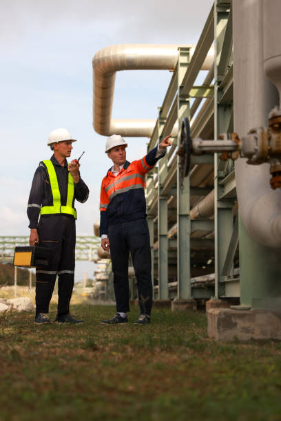 istock The piping system engineer and technician work onsite in the piping systematic of the refinery 2026041136