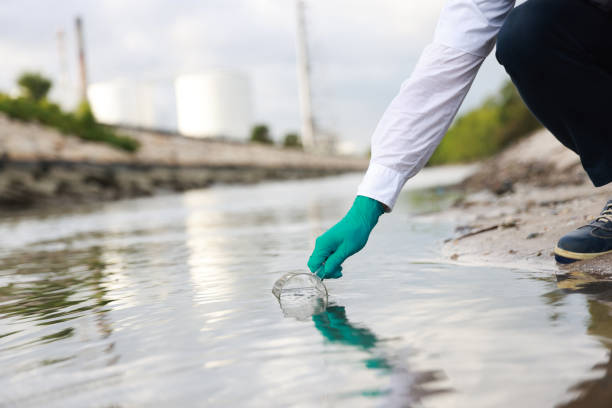istock A male biologist taking a water sample from refinery 2026112717