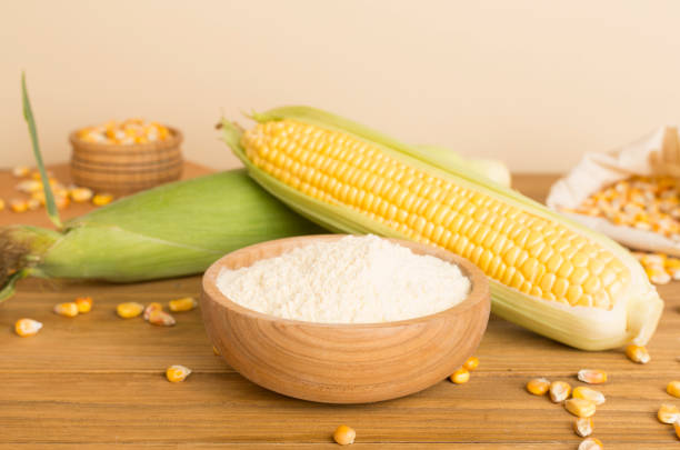 istock Corn flour with fresh cobs on wooden table 2026122227