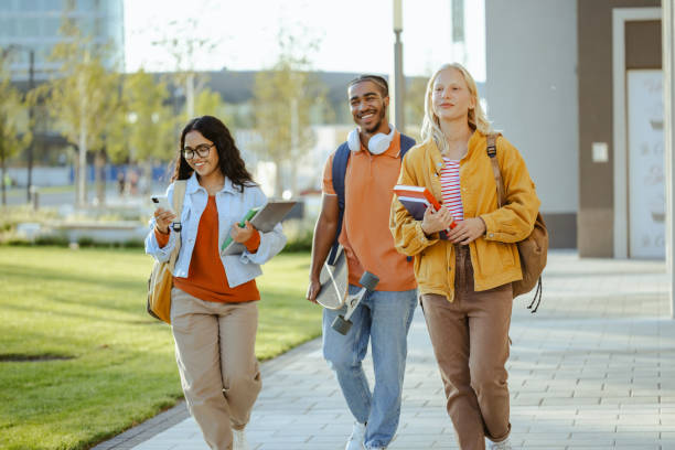 istock Cheerful students walking together on the street 2026132147