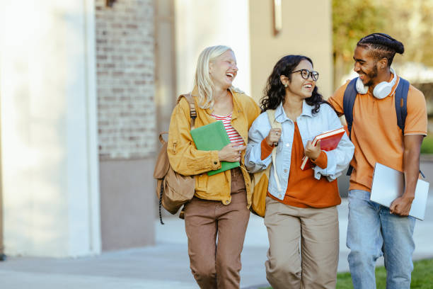 istock Cheerful students walking together on the street 2026139191