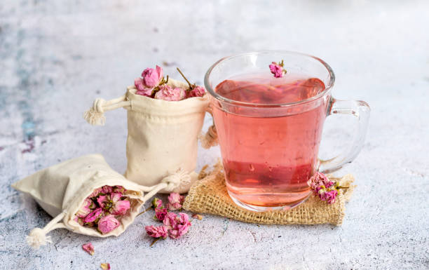 Tea of roses Tea of roses with roses flowers pink tea stock pictures, royalty-free photos & images