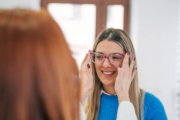 istock A young woman in an optician's shop. 2026156207