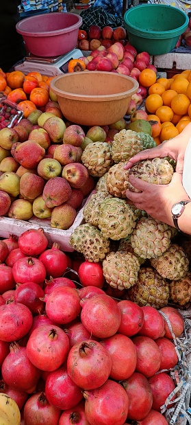 Pomegranate, custard apples, oranges, apples