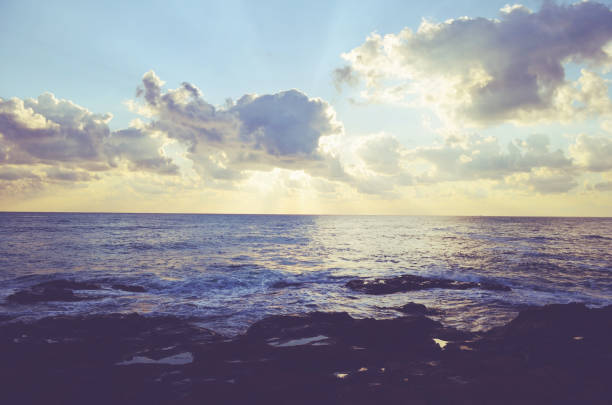 Beautiful sea cloudy  sunset background . Sunset with multi colored clouds