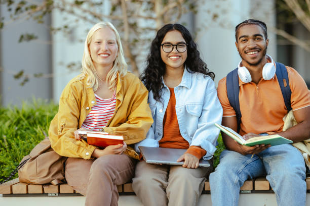 istock Portrait of a happy diverse students on the bench 2026187055