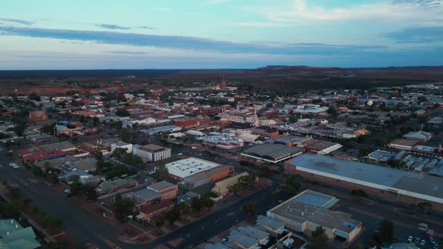drone shot flying over Kalgoorlie Boulder at sunset, famous australian mining city in the outback, Western Australia
