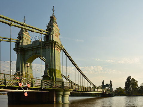 Hammersmith Bridge closed to pedestrians and river traffic. Victorian suspension bridge crossing the river Thames, London