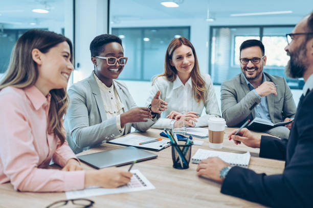 Group of business persons working together - foto de acervo