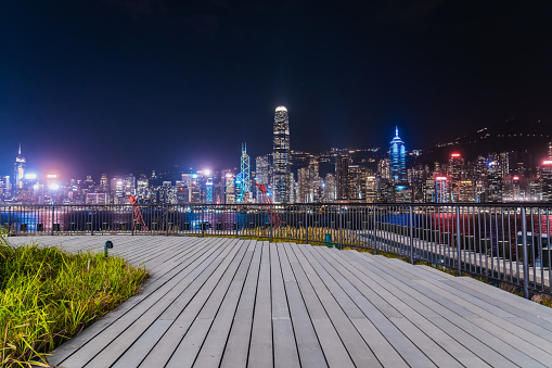 Platform and Hong Kong Harbour at night