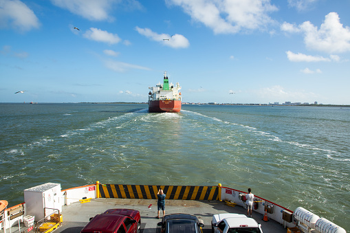 Huge ocean vessel is located in a drydock at Hamburg port.  
