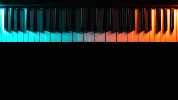 istock Keyboard instrument (piano, grand, synthesizer) with colored lighting - blue and orange light, low key, minimalistic. Atmospheric music, concert, advertising of music training courses. Copy space. 2026302898