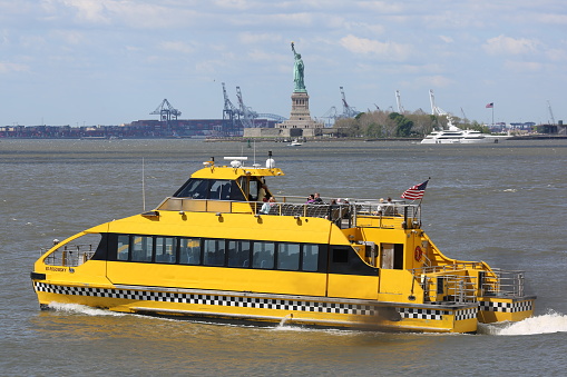 Fast Watertaxi sailing down the Hudson River in New York
