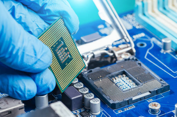 istock The technician repairing the computer. the concept of computer, CPU, motherboard, hardware, repairing, upgrade and technology. 2026355355