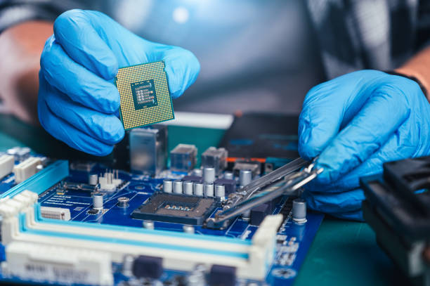 istock The technician repairing the computer. the concept of computer, CPU, motherboard, hardware, repairing, upgrade and technology. 2026356378