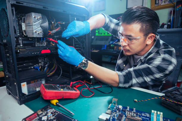 istock The technician repairing the computer. the concept of computer, CPU, motherboard, hardware, repairing, upgrade and technology. 2026356380