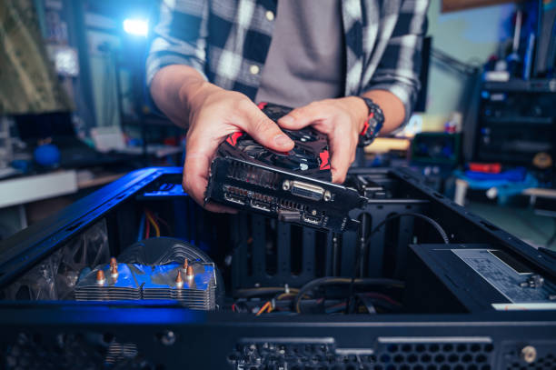 istock The technician repairing the computer. the concept of computer, CPU, motherboard, hardware, repairing, upgrade and technology. 2026359981
